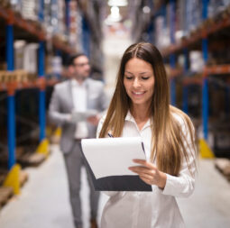 portrait-gorgeous-brunette-woman-manager-controlling-business-warehouse-logistic-center-well-dressed-successful-woman-checking-distribution-while-ceo-walking-her (1)